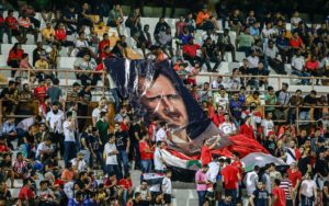 Assad banner in football stadium