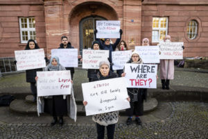 Biden-campaign-Syrian activists outside the court in Koblenz, Germany where Anwar Raslan was convicted for crimes against humanity