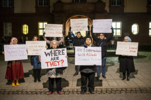 Families of the detained and disappeared in Syria protest outside a courtroom in Koblenz in January 2022